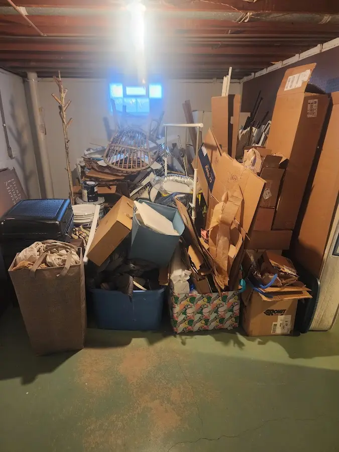 Roll-off dumpster container at job site for 2 Yard Dumpster Rental in Whitmore Village